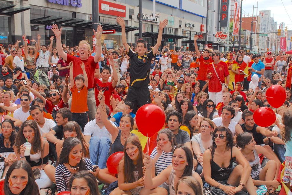 Spanish fans watch the 2010 FIFA World Cup at a free live match screening event held at Granville Street in downtown Vancouver. (Sergei Bachlakov/Shutterstock)