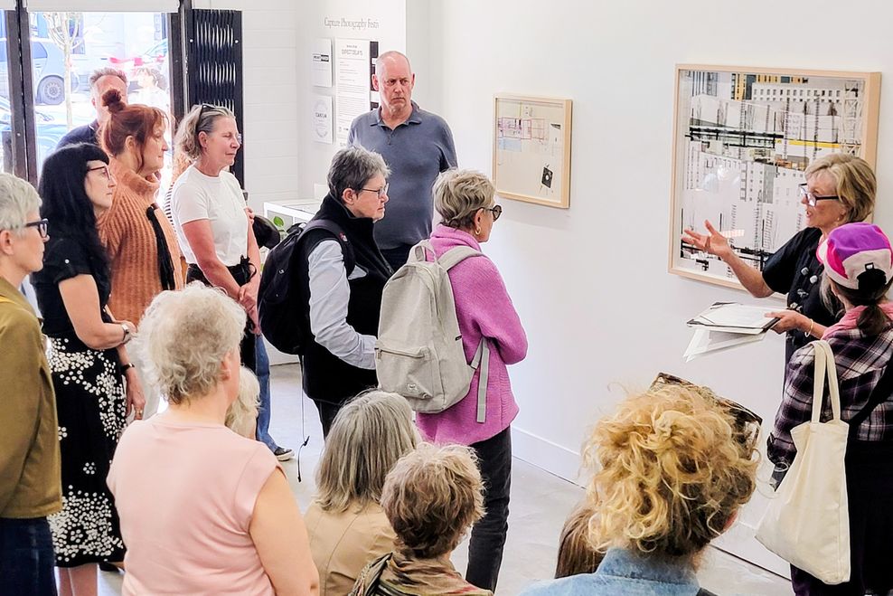 Gallery attendees admiring the work of artist Barbara Strigel (Gallery 881)