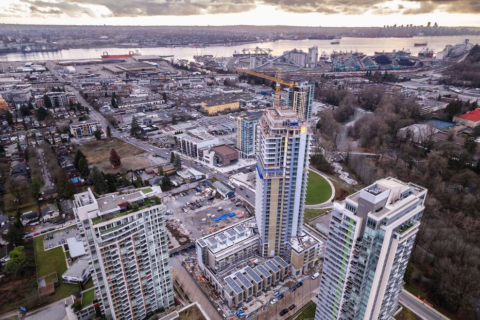Construction cranes for residential towers in North Vancouver. (Adam Melnyk/Shutterstock)