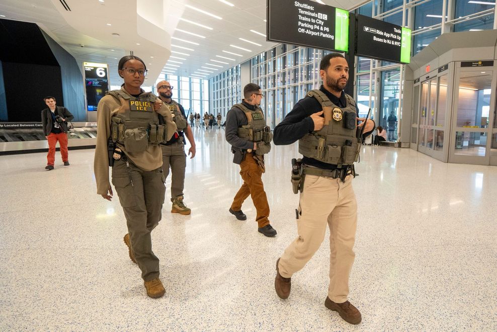 U.S. Immigration and Customs Enforcement agents walk around Terminal A at Newark Liberty International Airport on Monday, March 23, 2026, in Newark. (© Julian Leshay Guadalupe/NorthJersey.com/USA TODAY NETWORK via Imagn Images)